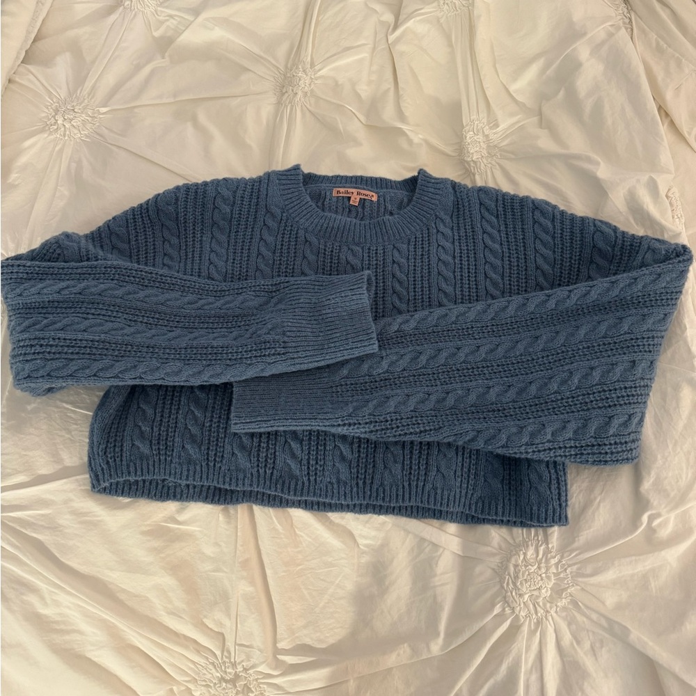 Blue knitted sweater